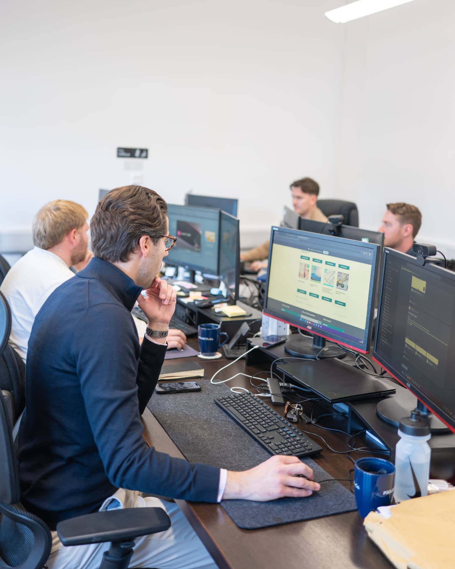 The Project & Co. team at work in the office